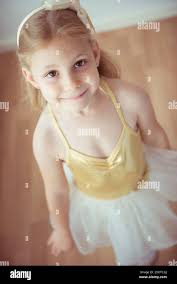 Cute little blonde girl dancing in ballet tutu Stock Photo - Alamy